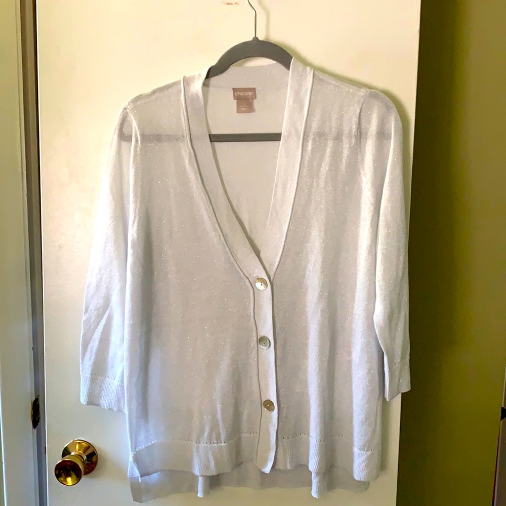 White/light grey whit shinny thread Cardigan Chico’s. Size 1